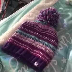 A dark purple,blue,and light purple hat